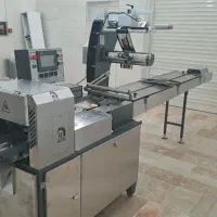 دستگاه بسته بندی دو سر پرس + تاریخ زن خودکار