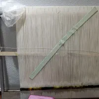 یک دستگاه دار قالیچه همراه با تجهیزات