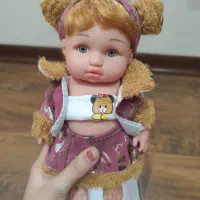 عروسک موزیکال دخترانه با لباس و کارتون دار