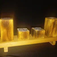 استند چوبی شمع سکه ای