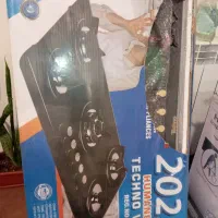 ماکروفر. گاز صفحه ای. جاروبرقی|اجاق گاز و لوازم برقی پخت‌وپز|بافت, |دیوار