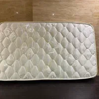 تشک نوزاد به همراه آویز تخت