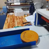 دستگاه دوخت و برش نایلکس