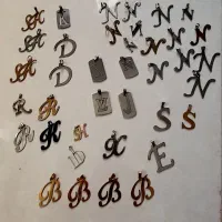 تعدادی پلاک حروف اول اسم انگلیسی رنگ ثابت