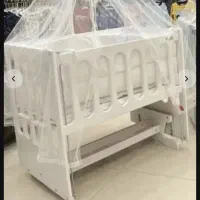 تخت گهواره ای نوزاد