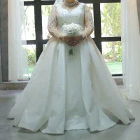 لباس عروس دست دوز مزونی سنگان کاری شده وشاینی