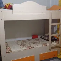 تخت چوبی دو طبقه