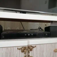 یک عدد دی وی دی فلش خور همراه دو باند