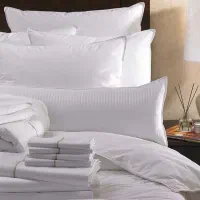 شستشوی ملحفه روی تخت و بالش