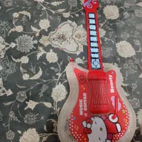 گیتار و چرخ خیاطی ۳۰۰