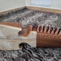 رباب میانه اصل|سازهای سنتی|زارچ, |دیوار