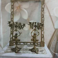 یک سری وسایل آنتیک مسی توضیحات خوانده شود