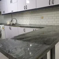 نصب برچسب ضد آب‌ کابینت و کاشی روکش نصاب دیوارپوش