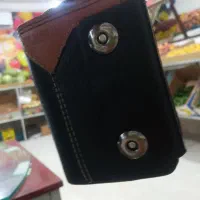 کیف چرم به همراه یه مشت کارت