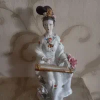 یک عدد شمعدان قدیمی ومجسمه|صنایع دستی و سایر لوازم تزئینی|مشهد, آزادشهر|دیوار