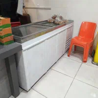 فریزر فریدونی در شیشه ای موتور امبراکو