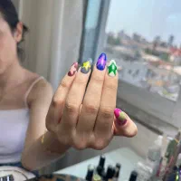ترمیم و کاشت ناخن با طراحی
