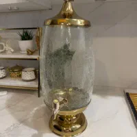کلمن شیشه ای طرح ترک با پایه ها و درب استیل