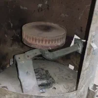 بخاری هیزمی - گازی