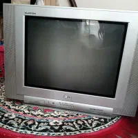 تلویزیون ۲۱ اینچ ال جی و سشوار ایستاده