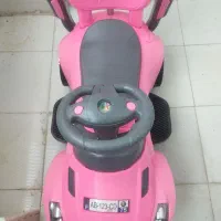 ماشین‌ دسته دار بچگانه