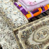 تعدادی تشک.بالش.کناره.پشتی