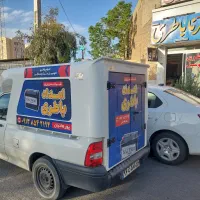 باطری ماشین ( سیار ) و درب مغازه