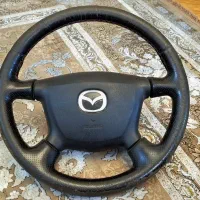 فرمون مزدا ۳۲۳