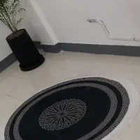 فرش گرد گل و گلدان