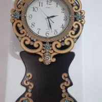 ساعت دیواری و تابلو