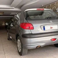 پزو۲۰۶ سالم فقط درب مونور تعویض