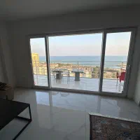 ویو از سالن و اتاق خواب|اجارهٔ کوتاهمدت آپارتمان و سوئیت|کیش, |دیوار