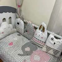 سرویس ملحفه و روتختی کودک و نوزاد و تور بالای تخت