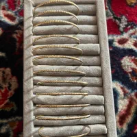 12 تا النگو طلا جمعا ۵۰ گرم