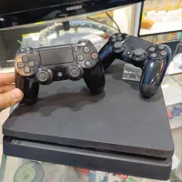 کنسول PS4 Slim یک ترا - در حد نو با کارتن و بازی