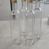 بطری شیشه ای ۵۰۰ میلی (نیم لیتری)