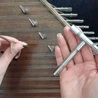 کوک و تعویض سیم سنتور