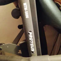 یک دستگاه تردمیل MTM5600 و یک عدد دراز نشست