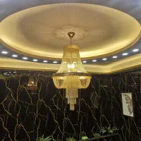 میز و صندلی تالار لوستر کولر گازی بشقاب و قاشق و.