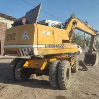 بیل مکانیکی لاستیکی