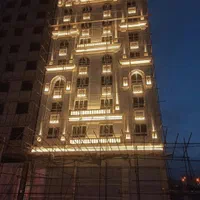 نصب داربست فلزی«بخشنده»و پیچ و روپلاک کوبی نما
