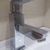 شیر روشویی مارک قهرمان و شیر آفتابه مارک راسان.