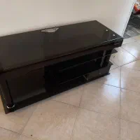 زیر تلویزیونی شیشه ای