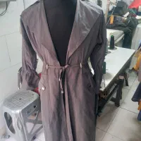 پالتو وبارانی|لباس|قدس, شهرقدس|دیوار