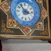 ساعت مینا کاری شده و تابلو نقره کوب هردو نو هستن
