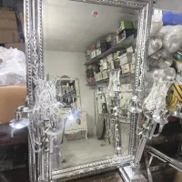 آینه و کنسول قلم کاری.