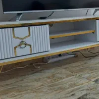 میز تلویزیون ومیز اتو که هردو درحدنوعن