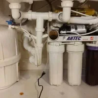 تعویض فیلتر دستگاه تصفیه آب