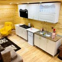 کلبه چوبی سوئیسی|اجارهٔ کوتاه‌مدت ویلا و باغ|بندر انزلی, گیلار|دیوار