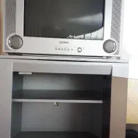 تلویزیون و زیر تلویزیون و دستگاه دی جی تال و دی وی